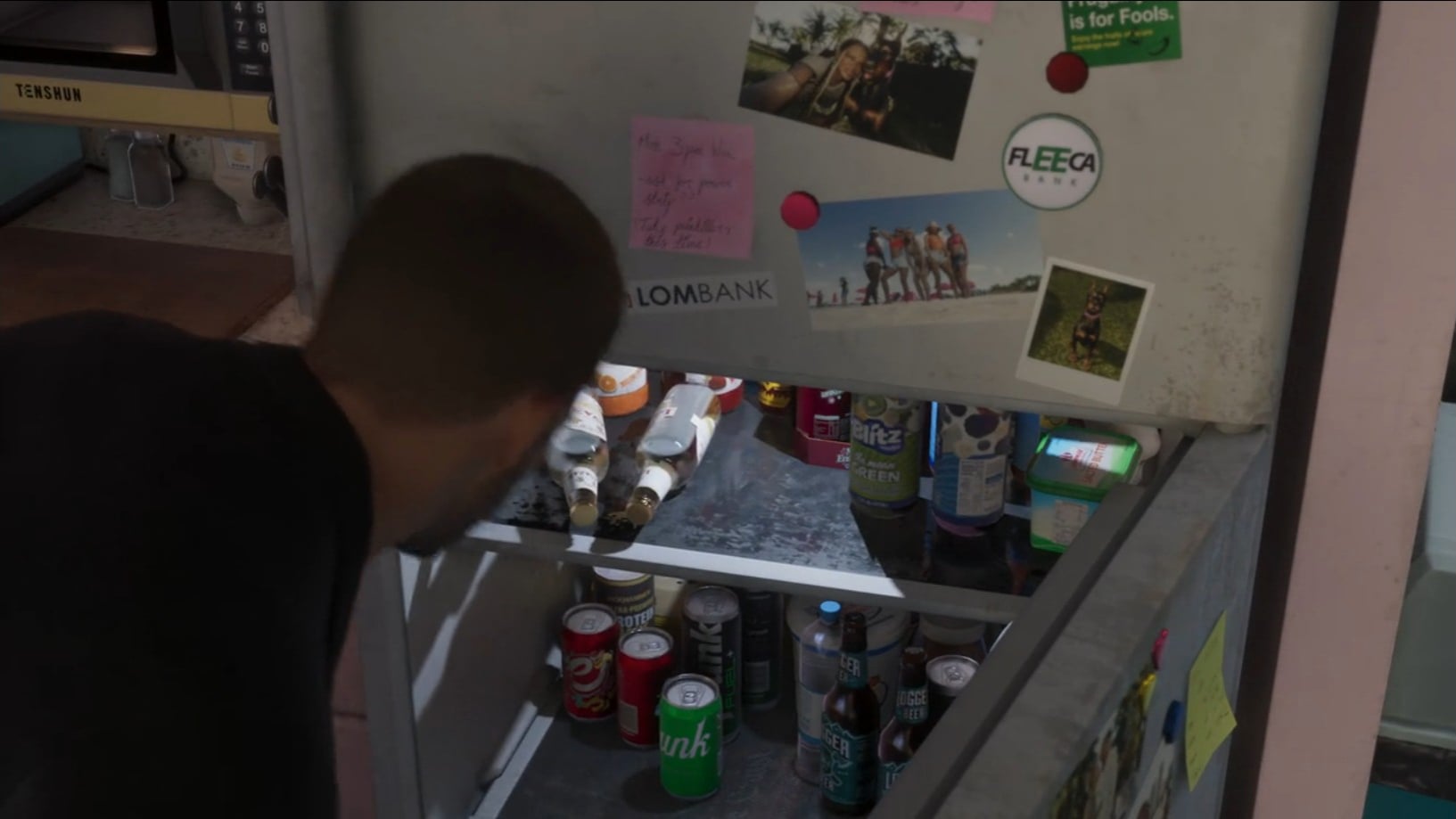 Jason looking into the open fridge in GTA 6, stocked with beer, soda, and almost no real food